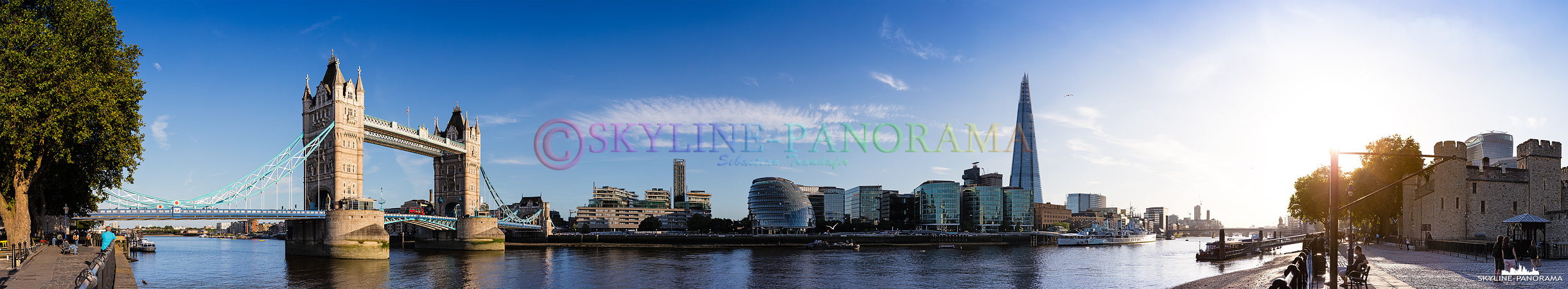 London am Tag - Die Skyline von London mit der historischen Tower Bridge, der Londoner City Hall und dem futuristischen Hochhaus The Shard vom Themse Ufer aus gesehen.