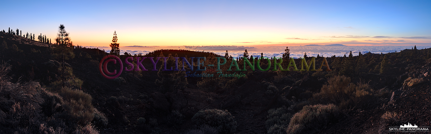 Panorama Teneriffa - Der Sonnenuntergang über der Wolkendecke im Teide Nationalpark auf der spanischen Insel Teneriffa.