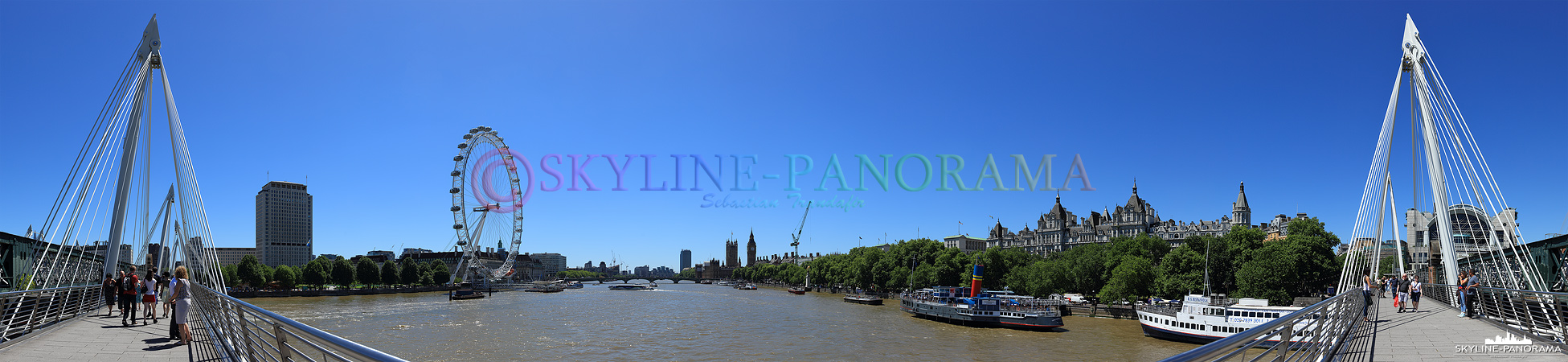 Bilder aus London - Das Panorama von der Hungerfort Bridge in Richtung London Eye und Westminster Palace mit Big Ben. 